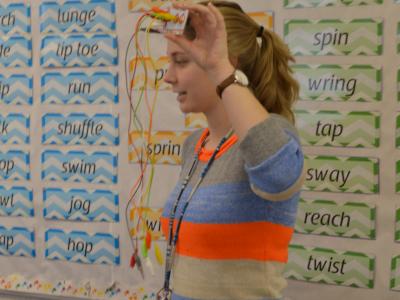 Ms-Cartwright-showing-students-the-makey-makey-device